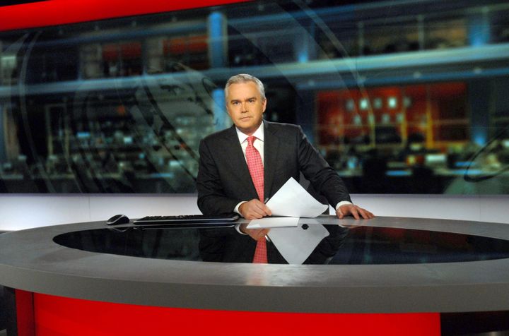 Huw Edwards in the news studio for BBC News at Ten.
