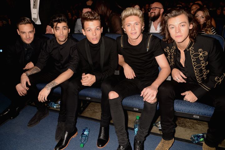 From left: One Direction's Liam Payne, Malik, Louis Tomlinson, Niall Horan and Harry Styles attend the American Music Awards on Nov. 23, 2014.