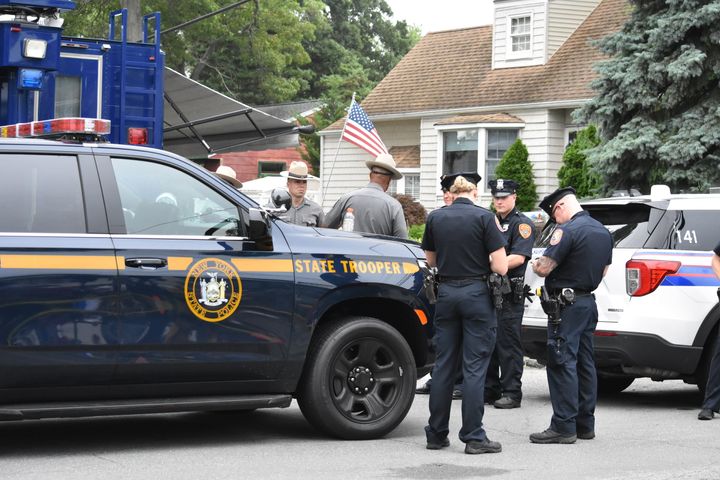 An area in Massapequa Park, Long Island, is cordoned off Friday after a suspect is arrested in the Gilgo Beach serial killings.