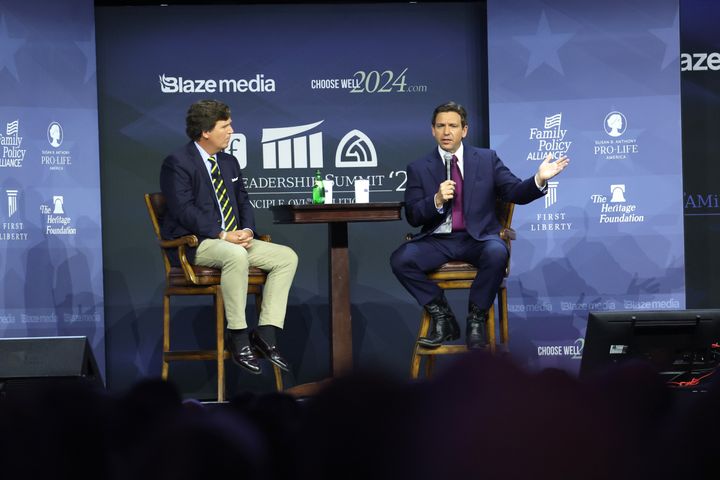 Florida Governor Ron DeSantis fields questions from former Fox News Television personality Tucker Carlson at the Family Leadership Summit on July 14, 2023, in Des Moines, Iowa. Several Republican presidential candidates were scheduled to speak at the event, billed as “The Midwest’s largest gathering of Christians