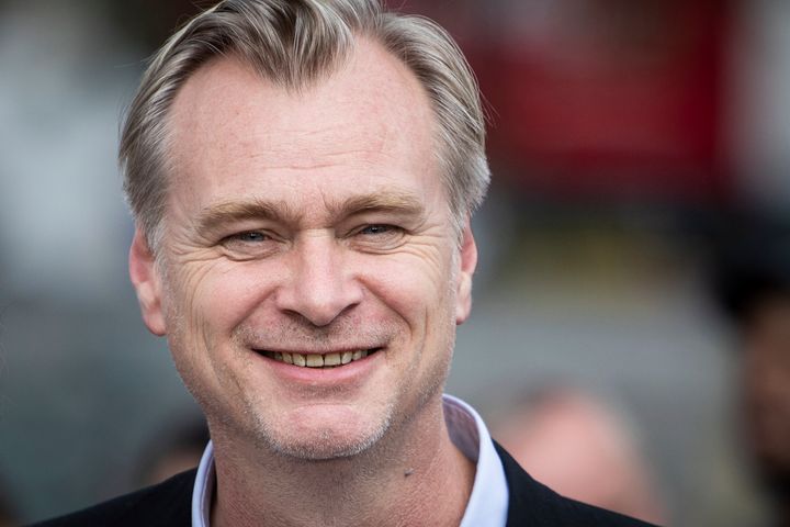 "Oppenheimer" director Christopher Nolan said he doesn't use a smartphone in part because he's easily distracted.