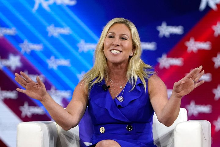 Rep. Marjorie Taylor Greene (R-Ga.) answers questions during a panel discussion at the Conservative Political Action Conference on Feb. 26, 2022, in Orlando, Florida. 