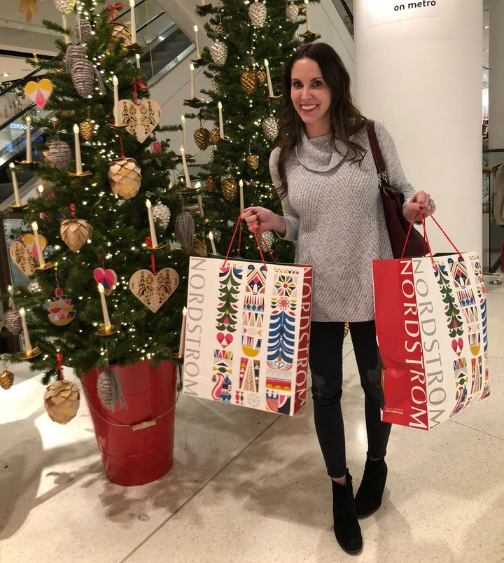 "A photo op after a '$1,000 shopping spree' awarded by the company," the author writes. "I ended up spending well over the allotted $1,000, including getting a babysitter for the day. But it looked good on social media!"