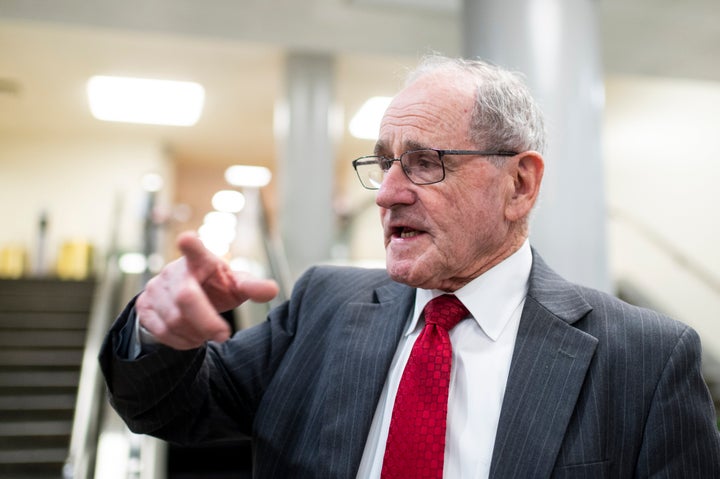Sen. Jim Risch (R-Idaho) speaks with reporters in the Senate subway after a vote in the Capitol on Feb. 9, 2022.