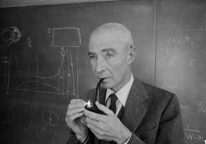Oppenheimer stands in front of a blackboard in his office at the Institute for Advanced Study in Princeton, New Jersey, April 5, 1963.