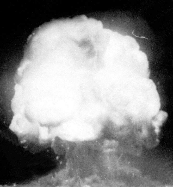 The first U.S. atom bomb explodes during a test in Alamogordo, July 16, 1945. The cloud went 40,000 feet in the air, as viewed by an automatic camera six miles away from the site.