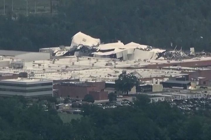 The roof of a Pfizer facility shows heavy damage after a tornado passed the area in Rocky Mount, North Carolina, on July 19, 2023.