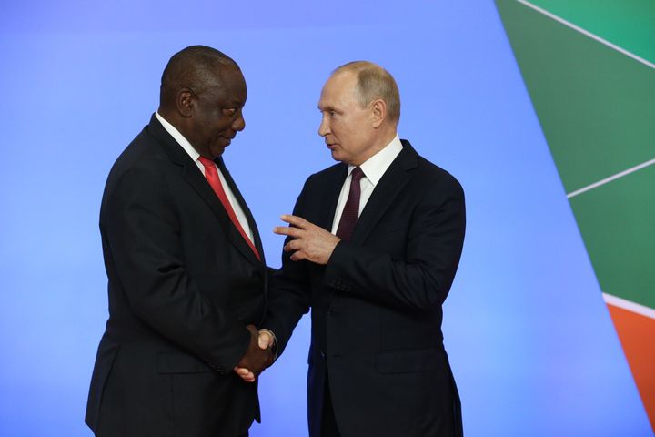 Russian President Vladimir Putin (R) greets South African President Cyril Ramaphosa (L) in 2019.