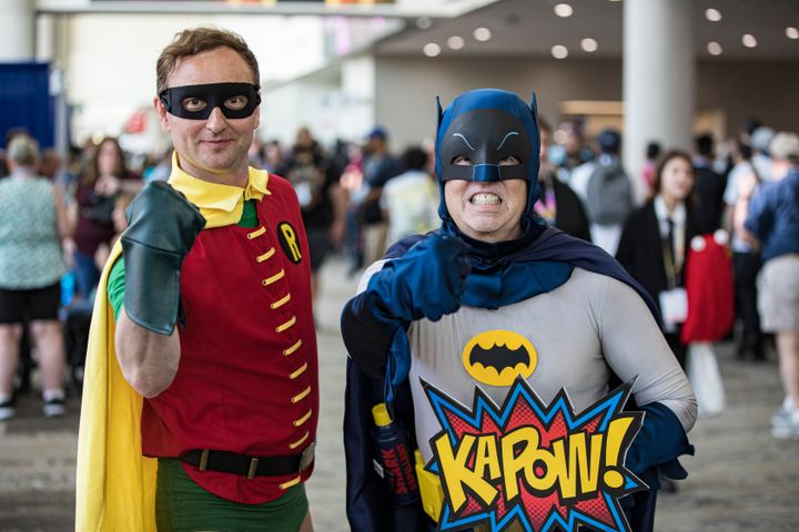 Cosplayers John Hickey as Batman (right) and Mark Fidelak as Robin pose at Comic-Con International 2023.
