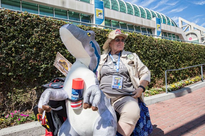 Jurassic Park cosplayer Burnadine Frakes poses outside Comic-Con International 2023.