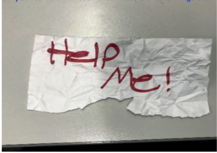 The "Help me" sign used by a 13-year-old girl allegedly kidnapped in Texas.
