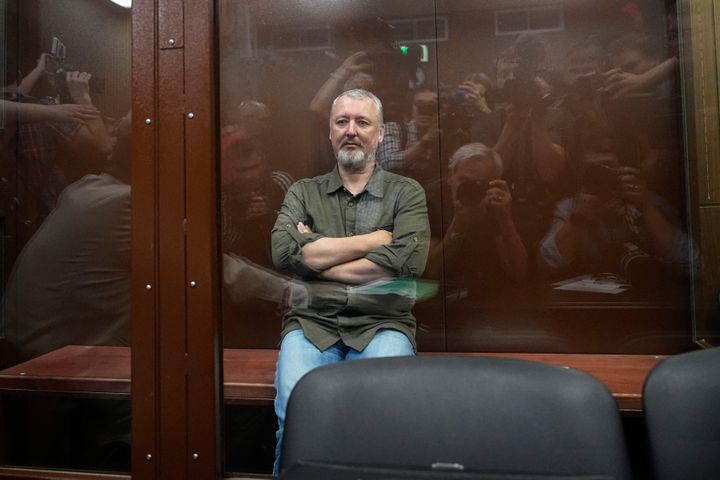 Igor Girkin, the former top military commander of the self-proclaimed "Donetsk People's Republic" and nationalist blogger, sits inside a glass defendants' cage following his arrest.