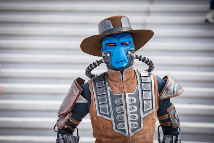 A Star Wars cosplayer as Cad Bane poses on Day 3 of Comic-Con International.