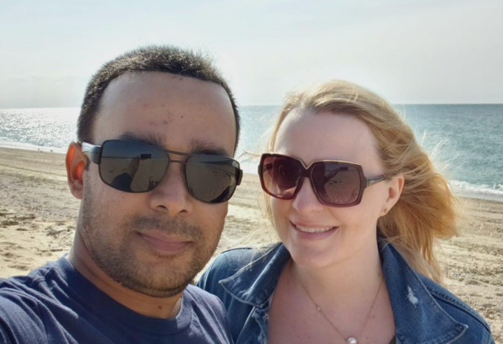 The author and her husband, Jawahar Shah, in Cape Cod, Massachusetts, on their first wedding anniversary in June 2019. "This was me before I got COVID," she writes.