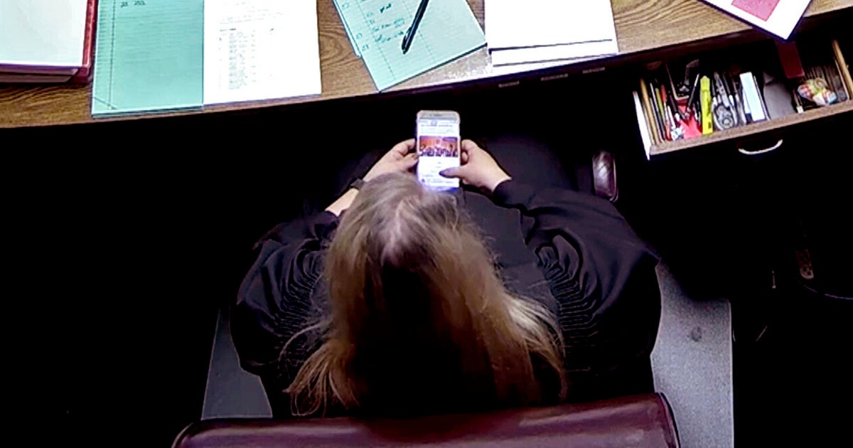 Video Shows Oklahoma Judge Using Phone, Checking Facebook During Murder Trial Video Shows Oklahoma Judge Using Phone, Checking Facebook During Murder Trial