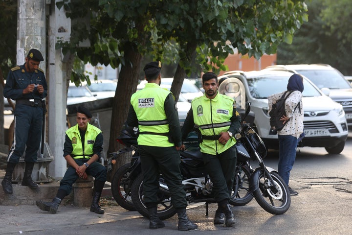 Iran's police forces stand on a street during the revival of morality police in Tehran, Iran, on July 16, 2023.