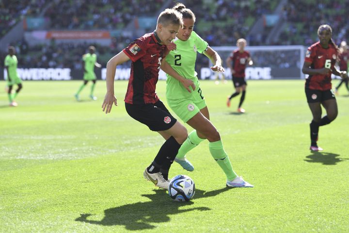 Quinn of Canada (L) playing in Fifa Women's World Cup