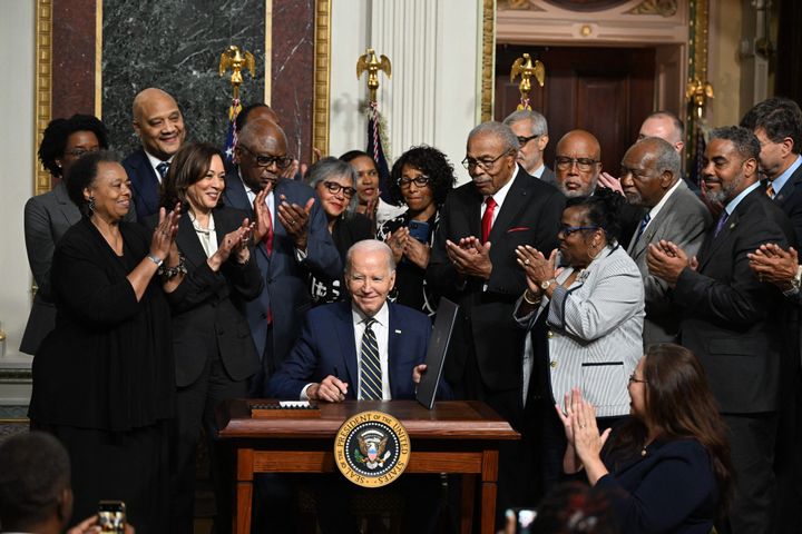 President Joe Biden signs a proclamation to establish the Emmett Till and Mamie Till-Mobley National Monument in Illinois and Mississippi.