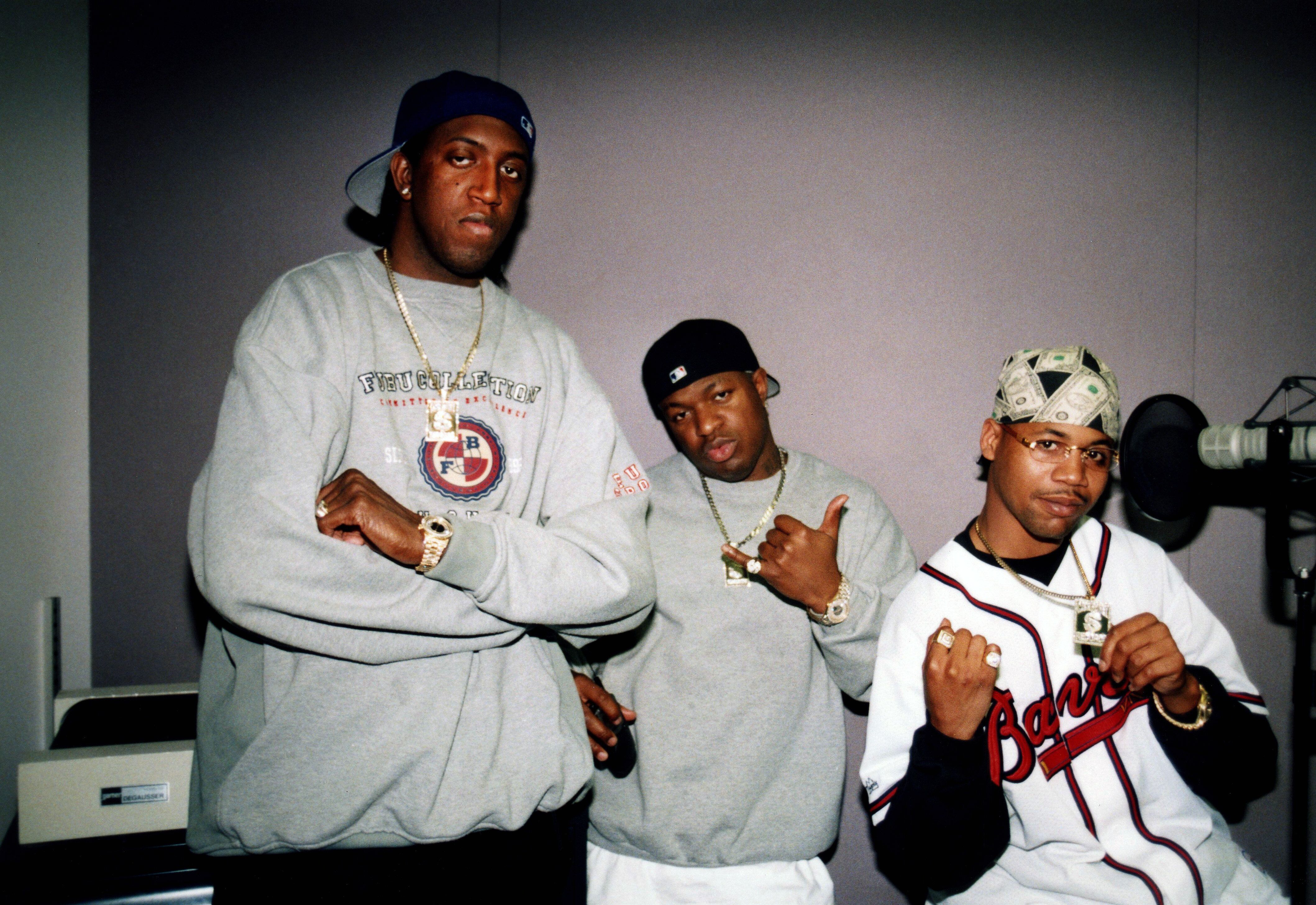Cash Money Millionaires CEOs Slim (Ronald Jay Williams) and Baby (Bryan Christopher Williams) pose for photos with rapper Juvenile at WGCI-FM radio in Chicago in March 1999. (Photo By Raymond Boyd/Getty Images)