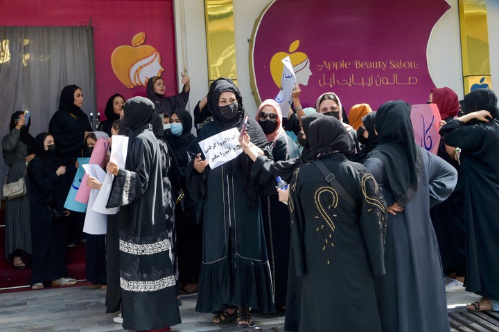 Afghan women stage a protest for their rights at a beauty salon in the Shahr-e-Naw area of Kabul on July 19, 2023. Afghanistan's Taliban authorities have ordered beauty parlours across the country to shut within a month, the vice ministry confirmed the latest curb to squeeze women out of public life. 