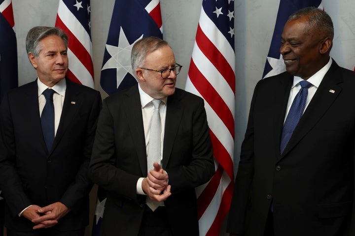 Australian Prime Minister Anthony Albanese, center, speaks with Secretary of State Antony Blinken, left, and Defense Secretary Lloyd Austin prior to a lunch in Brisbane, Australia, on July 28, 2023.