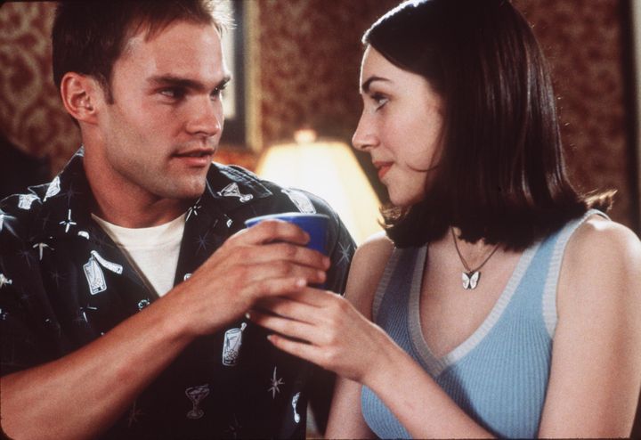 Stifler (Seann William Scott) tries to convince his latest conquest (Eden Riegel) that he truly cares about her in “American Pie.”