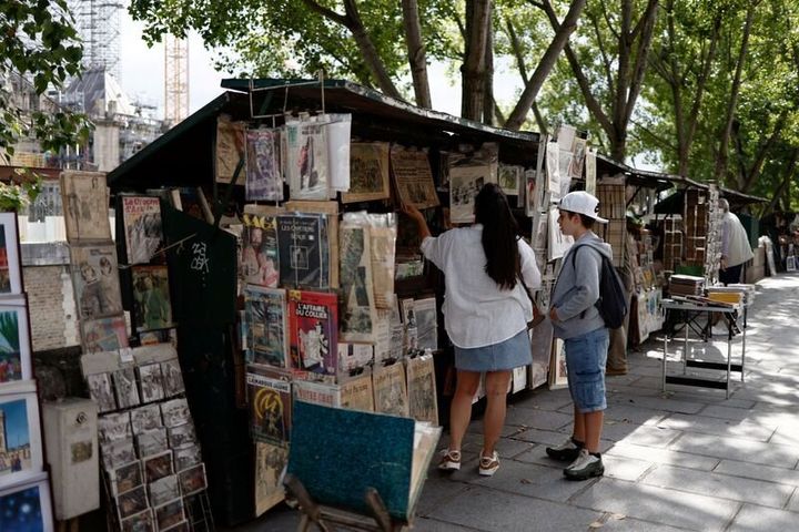 Seine River booksellers called "Bouquinistes" refuse to move their boxes for the 2024 Olympics in Paris