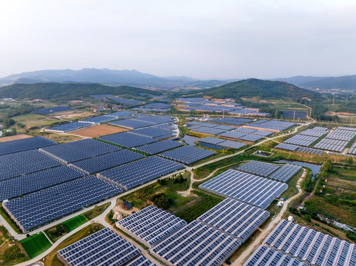 Solar panels on top of agricultural greenhouse