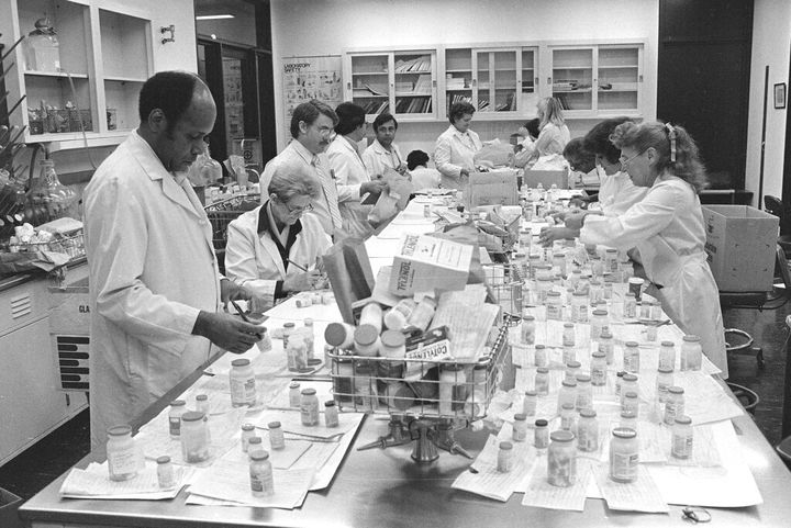 Chicago City Health Department employees test Tylenol medicines for cyanide content at a city lab, Oct. 4, 1982.