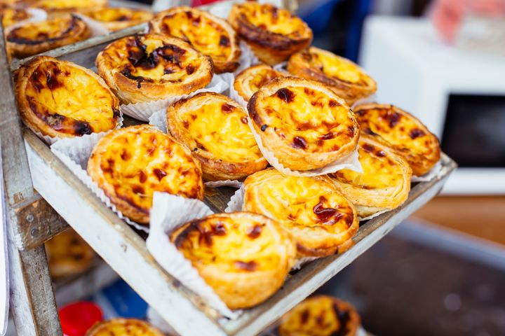 Pastéis de nata are quintessential food items to try in Lisbon.