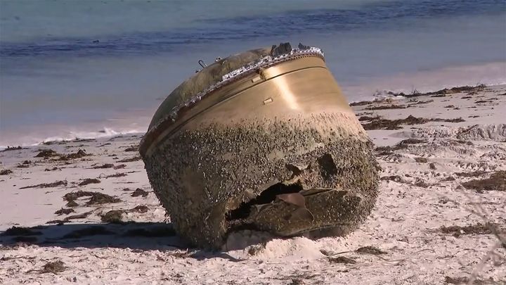 A mysterious cylindrical object is seen on beach in Green Head, Australia, July 17, 2023.