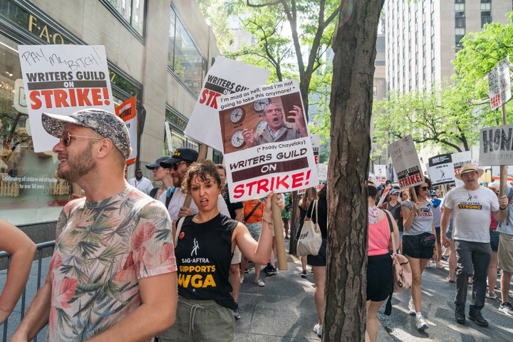 Striking members of the Writers Guild of America picket in front of NBC's headquarters in New York last week.
