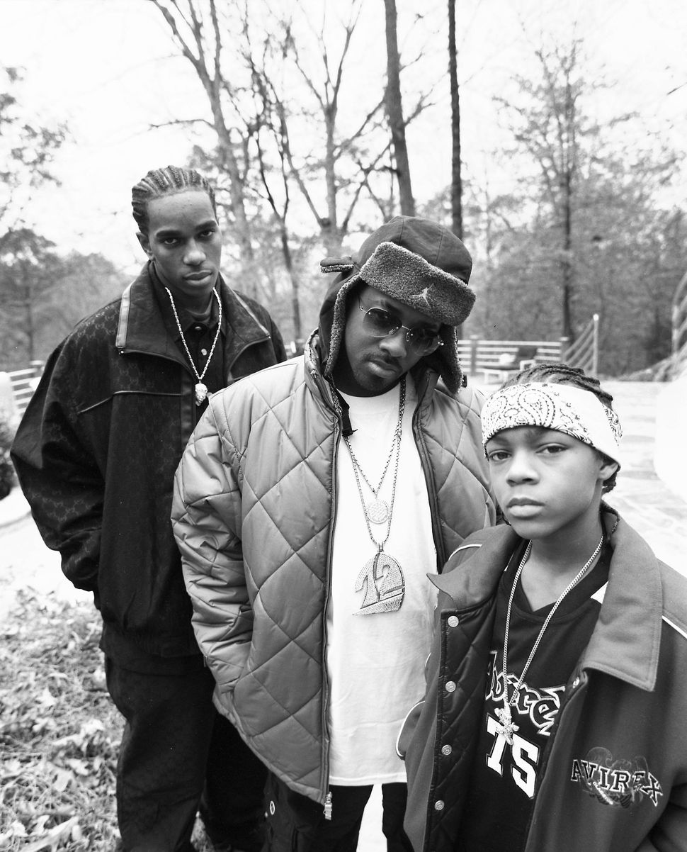 Musicians R.O.C., Dupri and Bow Wow pose for a photo in November 2001 in Atlanta.