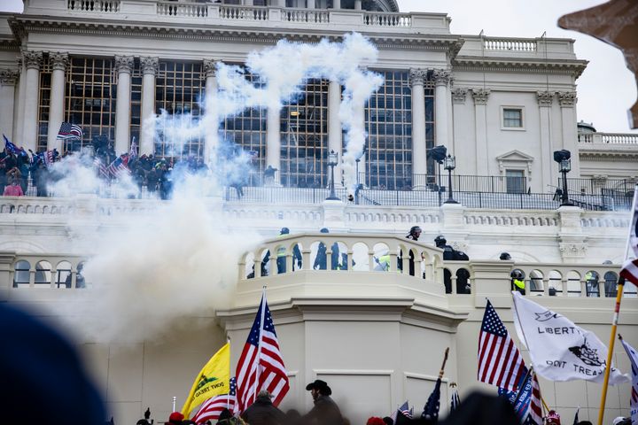 WASHINGTON, DC - JANUARY 06: Pro-Trump supporters storm the U.S. Capitol following a rally with President Donald Trump on January 6, 2021 in Washington, DC. Trump supporters gathered in the nation's capital today to protest the ratification of President-elect Joe Biden's Electoral College victory over President Trump in the 2020 election. (Photo by Samuel Corum/Getty Images)