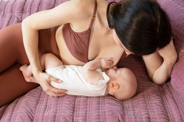 A baby feeding in the side-lying position.