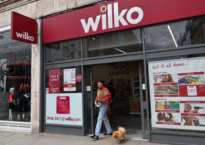 A shopper leaves a branch of Wilko in west London as the chain said it intends to appoint administrators, potentially putting up to 12,000 jobs at the high street retailer at risk.