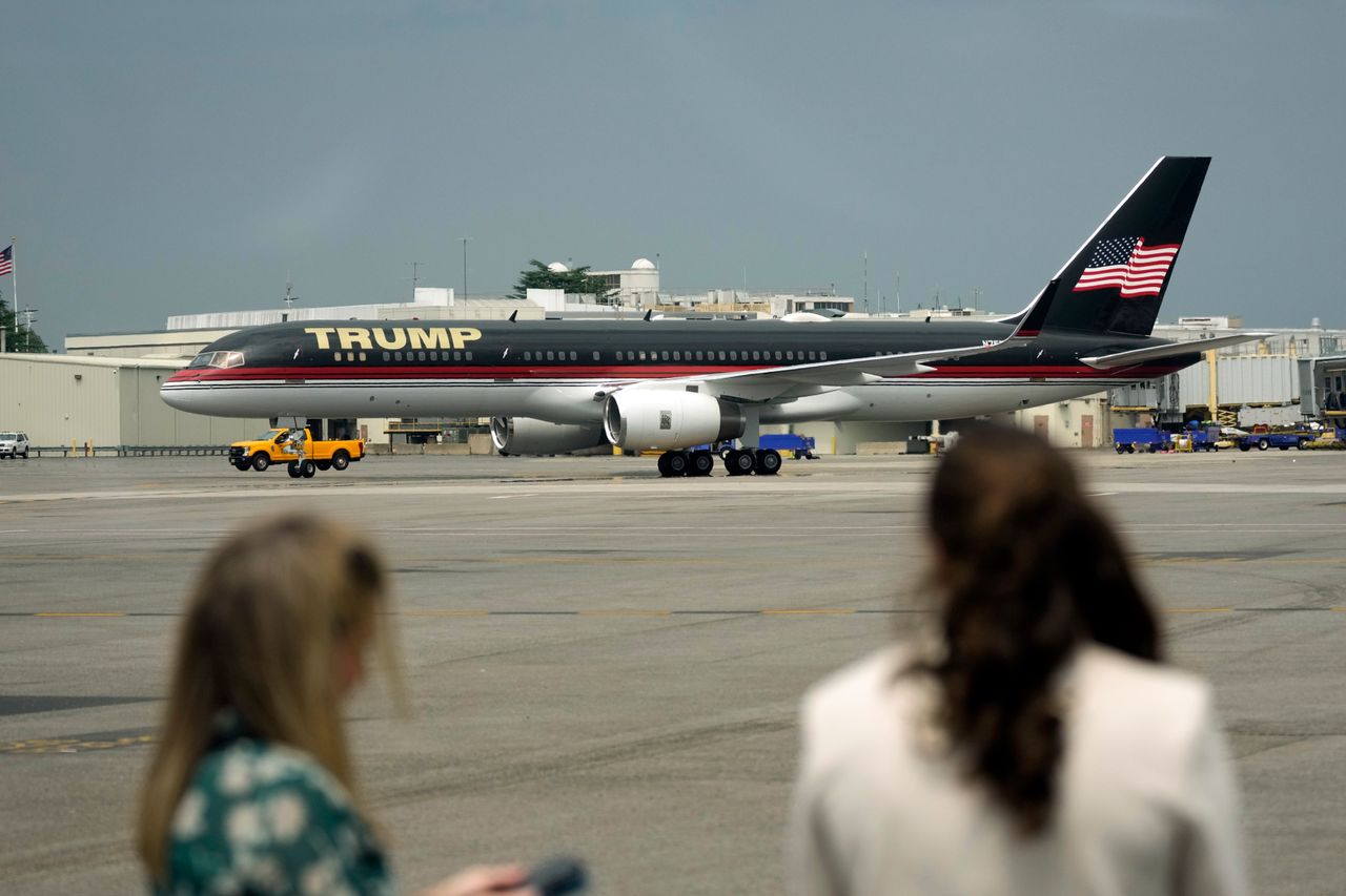 The plane carrying Trump arrives at Ronald Reagan Washington National Airport.