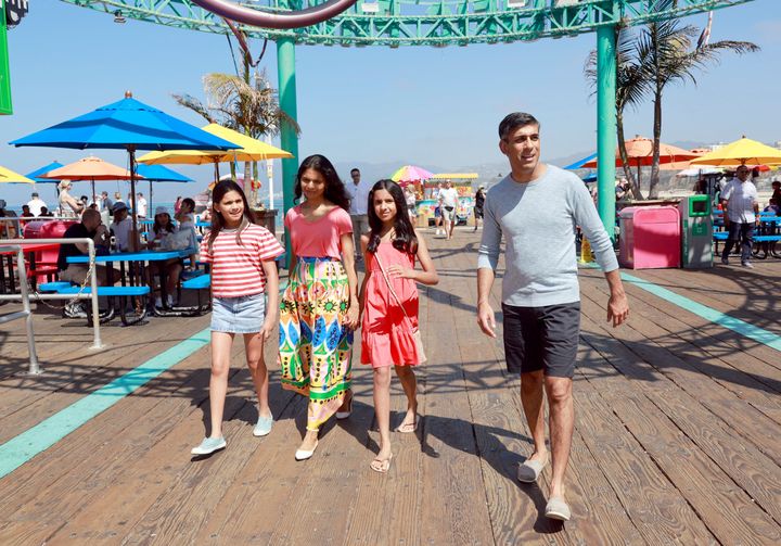 Rishi Sunak with his wife Akshata Murty and their daughters Anoushka and Krishna at Santa Monica Pier in Santa Monica, California.