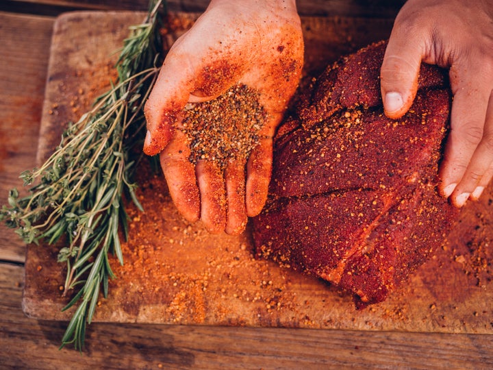 Mix coffee grounds with salt, sugar and other spices to create a flavorful and tenderizing rub.