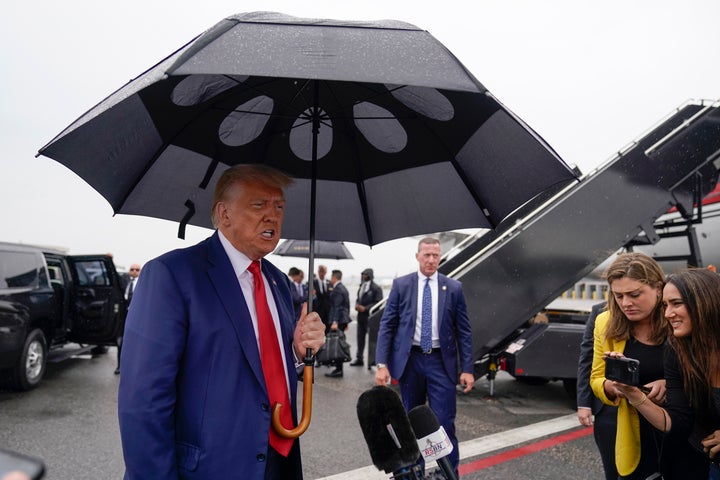 Former President Donald Trump speaks before he boards his plane at Ronald Reagan Washington National Airport, Thursday, Aug. 3, 2023, in Arlington, Va., after facing a judge on federal conspiracy charges that allege he conspired to subvert the 2020 election. (AP Photo/Alex Brandon)