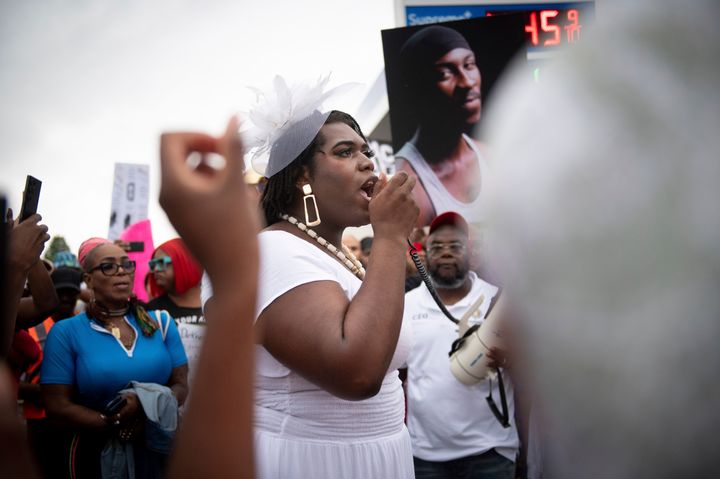 Queen Jean, of Trans-Liberation, speaks during a vigil to memorialize O'Shae Sibley on Friday. One of Sibley’s friends, Otis Pena, said in a Facebook video that Sibley was killed because he was gay and “because he stood up for his friends.”