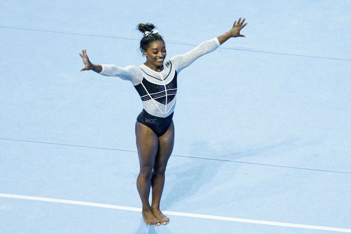 USA's Simone Biles, performs on the on the floor, during the 39th edition of the US Classic gymnastics competition at Now Arena in Hoffman Estates, suburb of Chicago, Illinois, on August 5, 2023. Four-time Olympic champion gymnast Simone Biles returned to competition for the first time since the Tokyo Olympics today at the US Classic, ending a two-year hiatus.The 19-time world champion began the event on the uneven bars, where her strong performance received a score of 14.000 points from judges before a cheering sellout crowd in suburban Chicago. (Photo by KAMIL KRZACZYNSKI / AFP) (Photo by KAMIL KRZACZYNSKI/AFP via Getty Images)