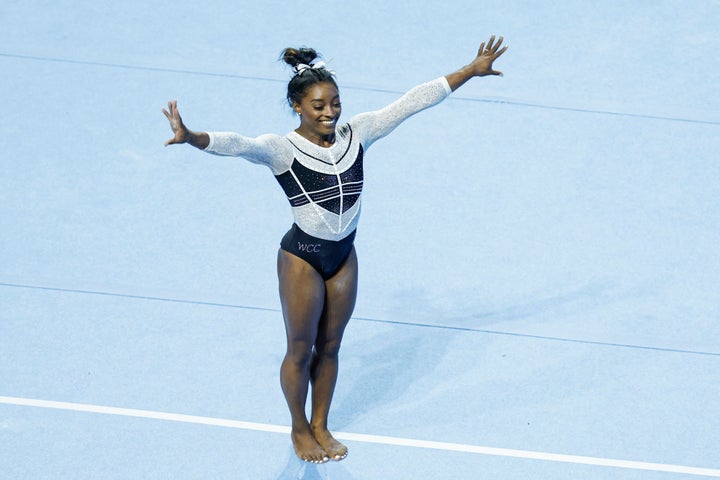 USA's Simone Biles, performs on the on the floor, during the 39th edition of the US Classic gymnastics competition at Now Arena in Hoffman Estates, suburb of Chicago, Illinois, on August 5, 2023. Four-time Olympic champion gymnast Simone Biles returned to competition for the first time since the Tokyo Olympics today at the US Classic, ending a two-year hiatus.The 19-time world champion began the event on the uneven bars, where her strong performance received a score of 14.000 points from judges before a cheering sellout crowd in suburban Chicago. (Photo by KAMIL KRZACZYNSKI / AFP) (Photo by KAMIL KRZACZYNSKI/AFP via Getty Images)