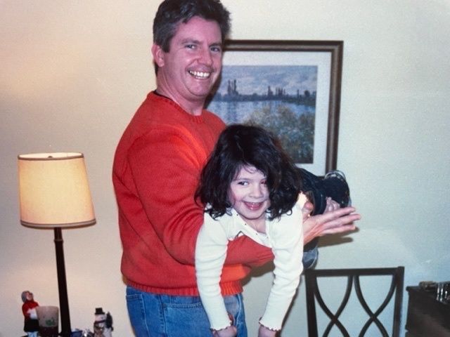 The author as a child with her dad.