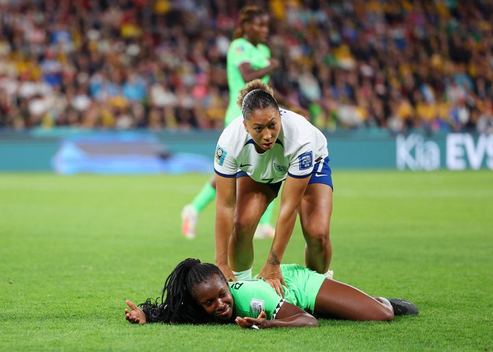 Lauren James of England stamps on Michelle Alozie of Nigeria before getting a red card.