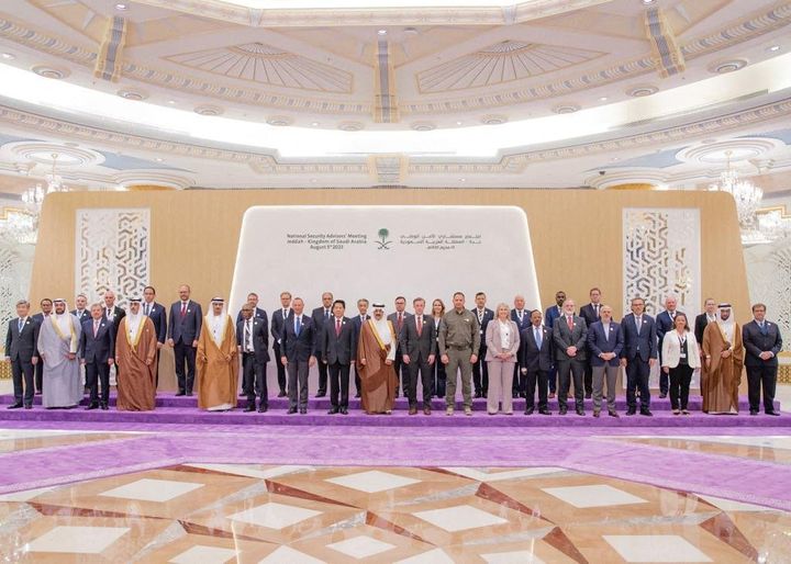 Representatives from more than 40 countries pose for a picture as they attend talks in Jeddah, Saudi Arabia, August 6, 2023.