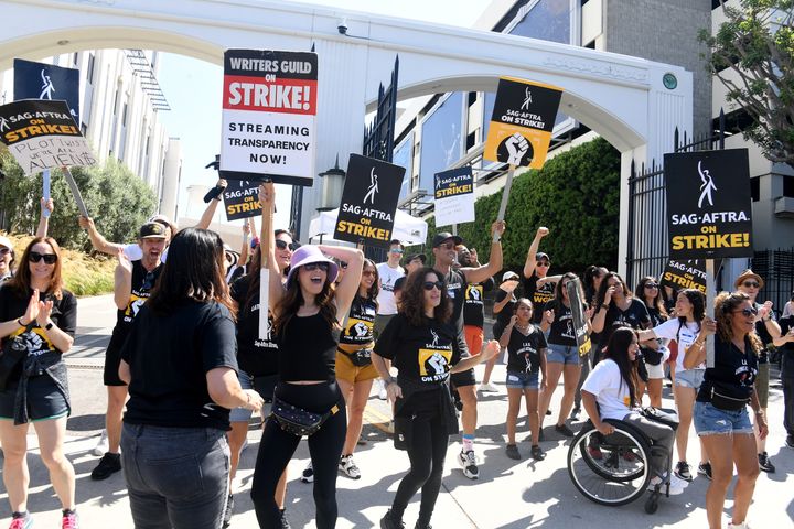 Members of the WGA and SAG-AFTRA striking on Friday in front of Sony Pictures Studios in Culver City, Calif., where "Jeopardy!" is filmed. 