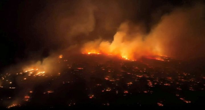 An aerial view of a wildfire in Kihei, Maui County, Hawaii, U.S., August 8, 2023 in this screen grab obtained from a social media video.