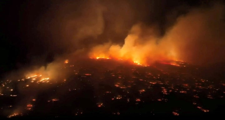 An aerial view of a wildfire in Kihei, Maui County, Hawaii, U.S., August 8, 2023 in this screen grab obtained from a social media video.