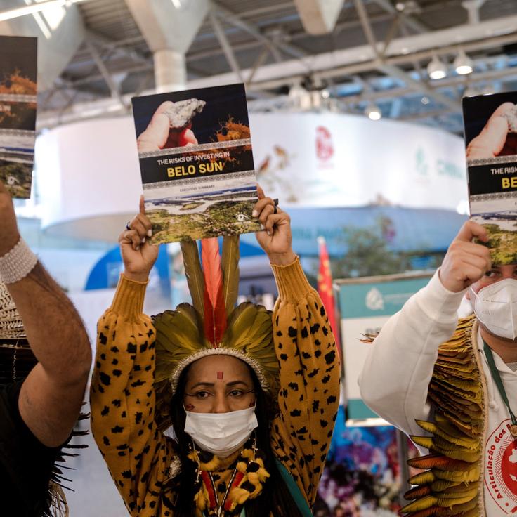 Indigenous activists protest in front of the Canada Pavilion against Belo Sun, a Canadian mining company, at the United Nations Biodiversity Conference in Montreal on Dec. 12, 2022. 